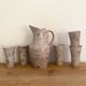 Speckled stoneware orangeade service signed FARAH (Vallauris, 19th century)