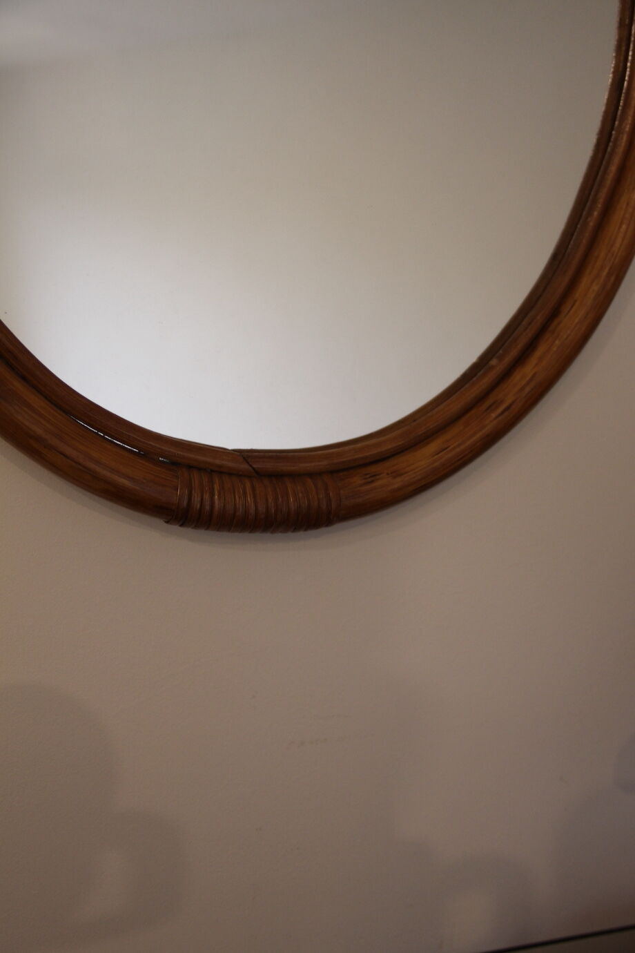 Oval bamboo mirror