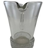 Large stylized glass pitcher