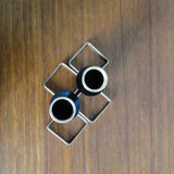 Pair of vintage candle holders in black metal and brass Sweden 1960