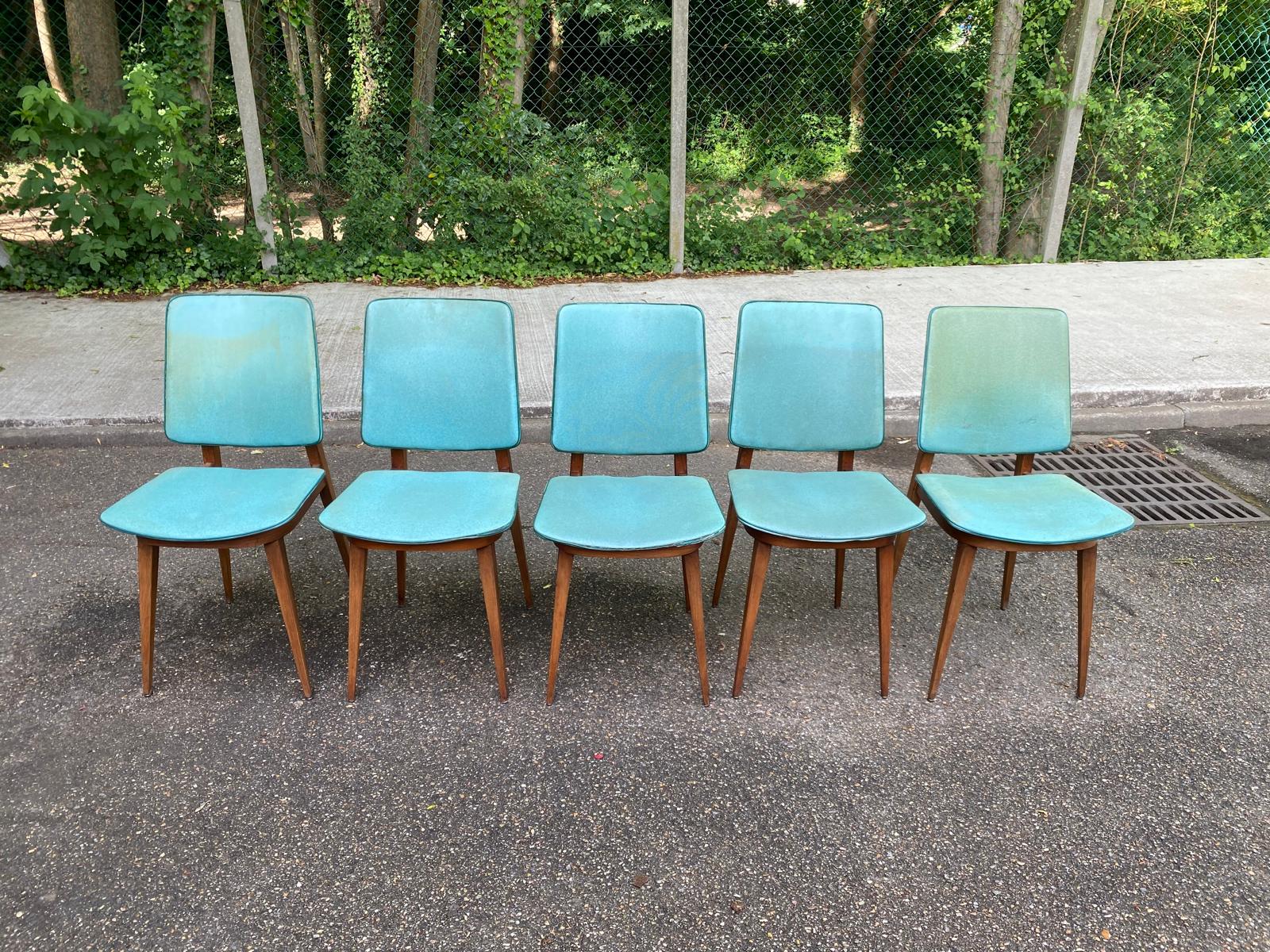 4 Scandinavian dining chairs in solid wood and blue-green leather from the 1950s.