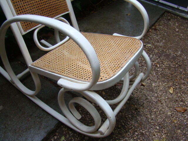Antique caned rocking chair