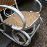 Antique caned rocking chair