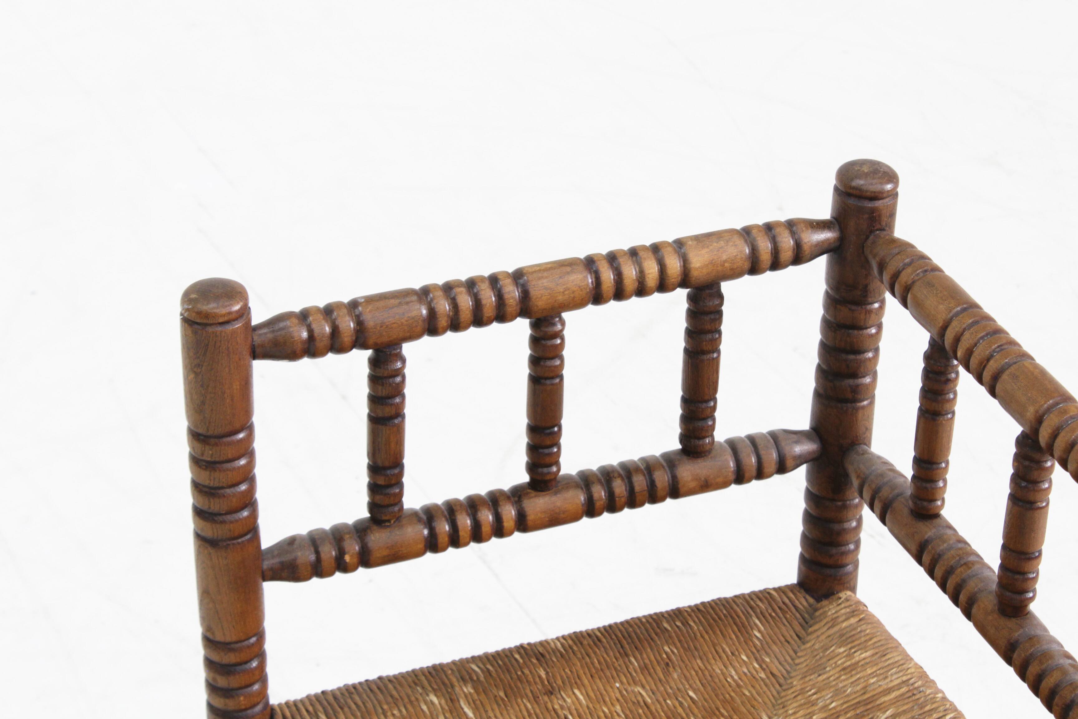 Vintage Bobbin bench with rush seat 1920s