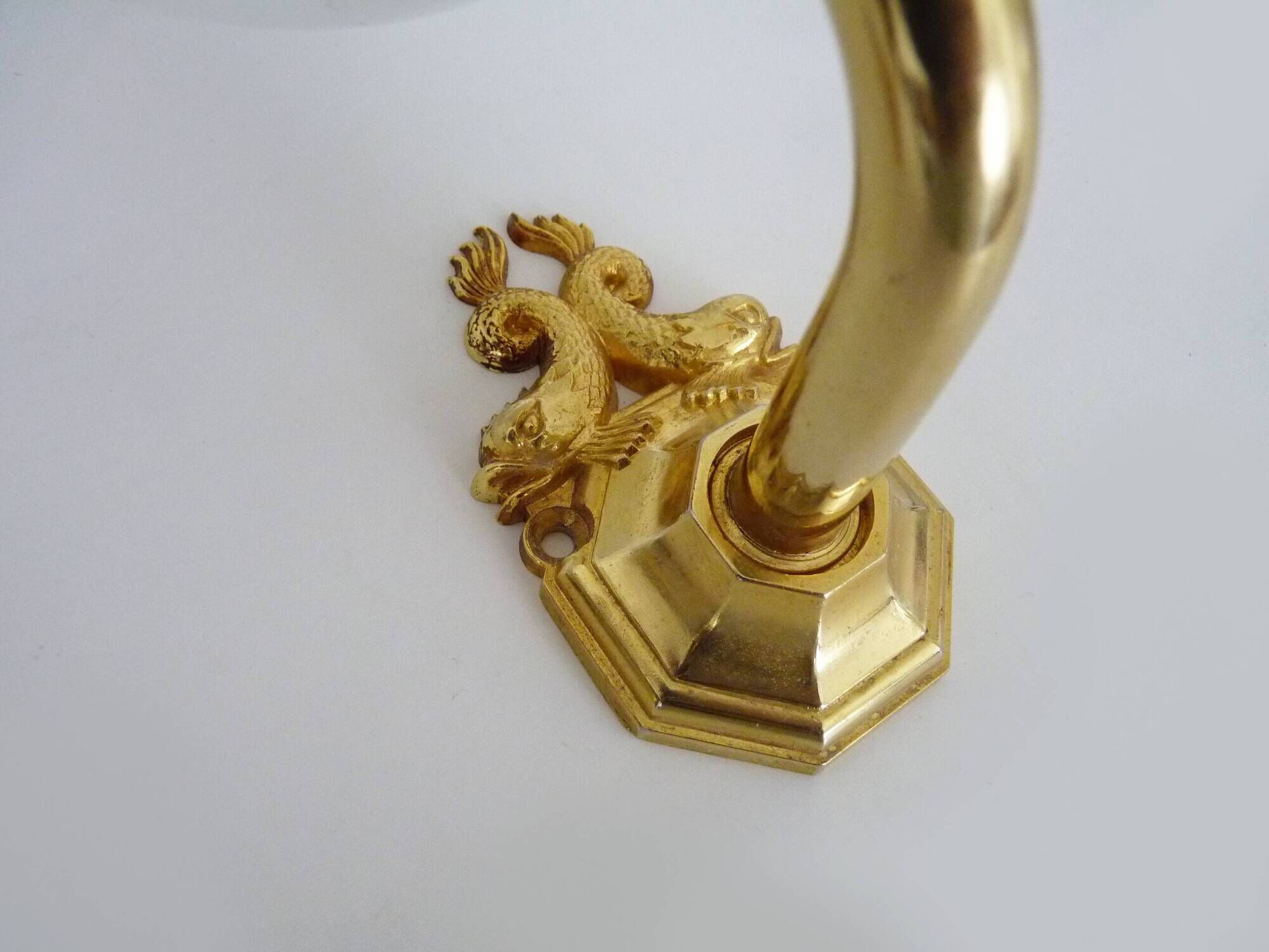 Pair of wall sconces with carp fish, brass and opaline globe.