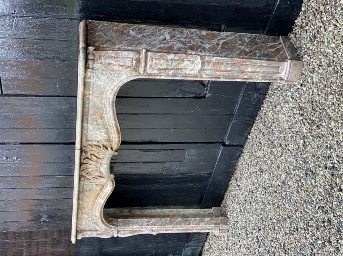 Fireplace in grey marble of the ardennes style louis xv early nineteenth century