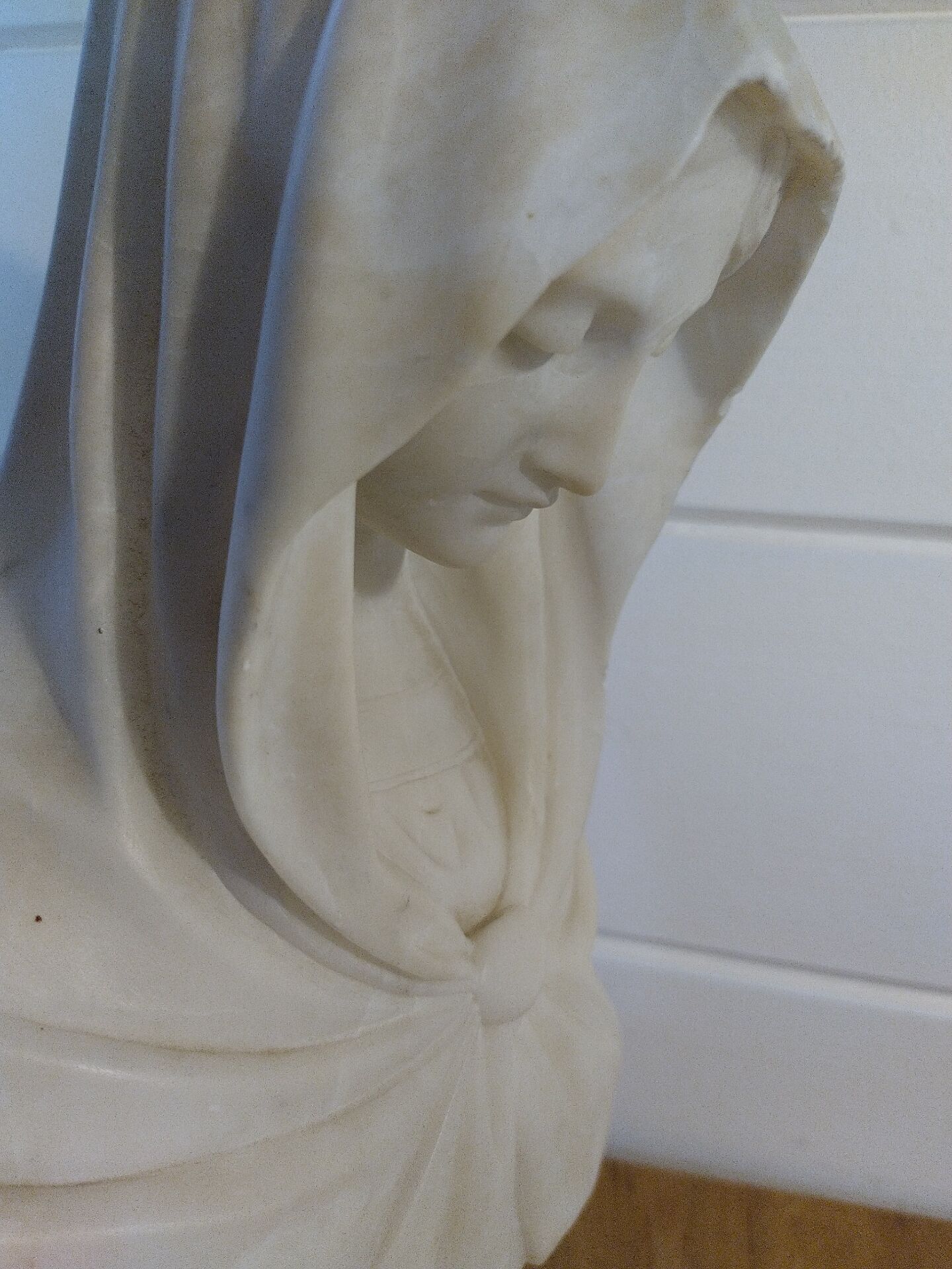 Bust of the Virgin in alabaster by Guglielmo Pugi.