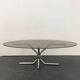 Table basse années 70 chrome et verre fumé