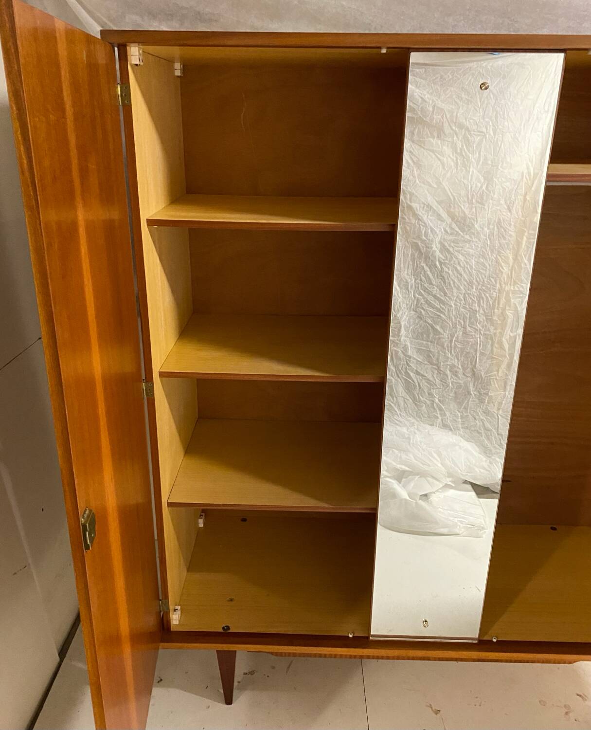 Vintage wardrobe with compass feet from the 60s