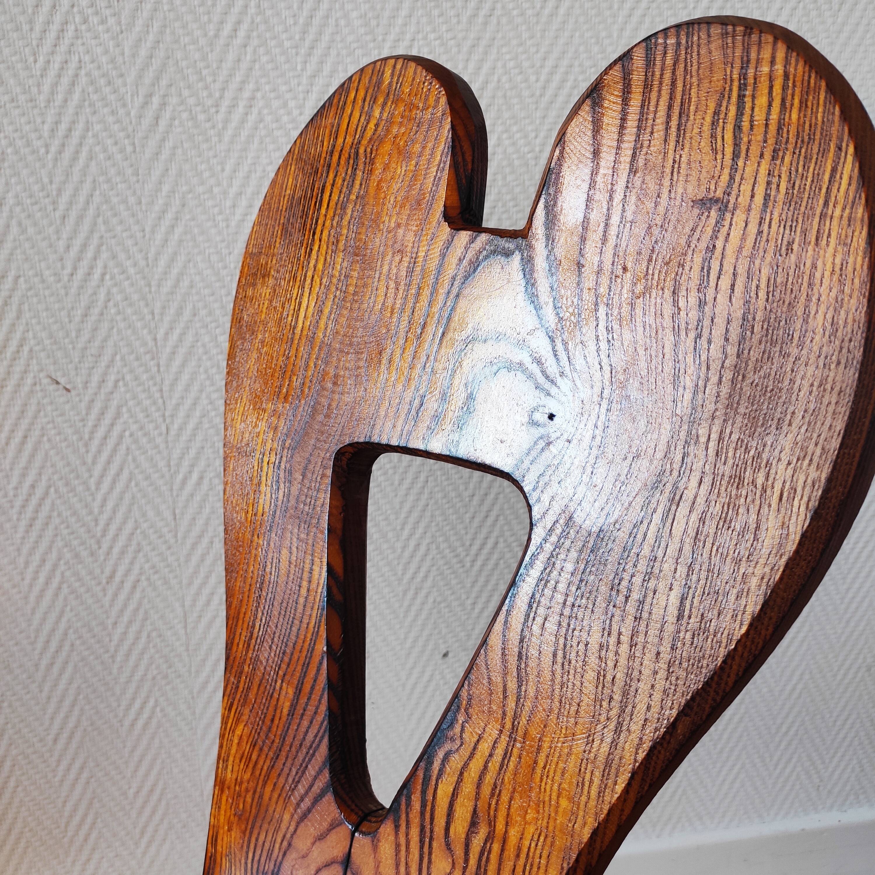 Vintage solid wood chair, popular art, brutalist style, 1950s, heart-shaped backrest.