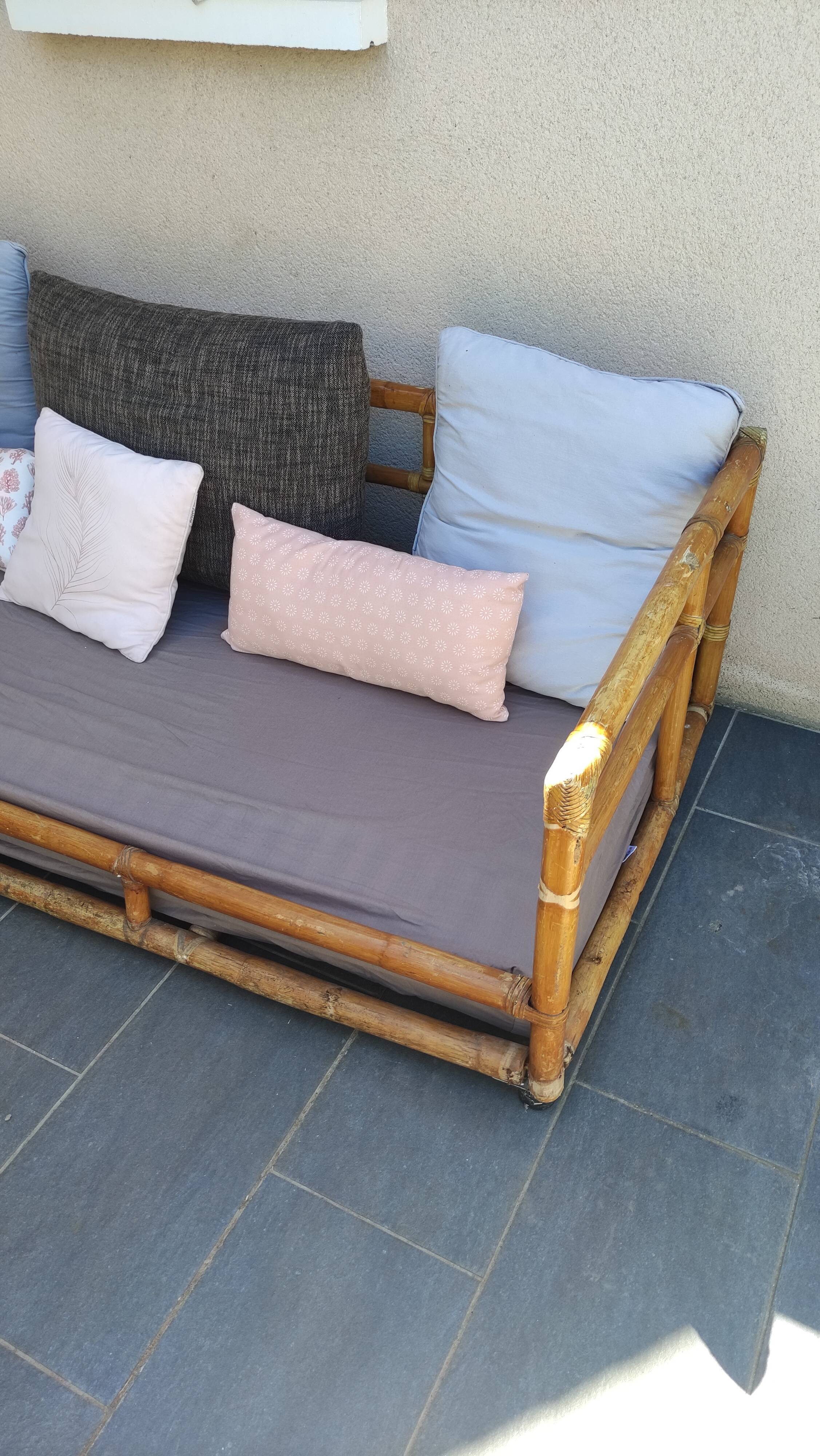 Large vintage rattan sofa bed