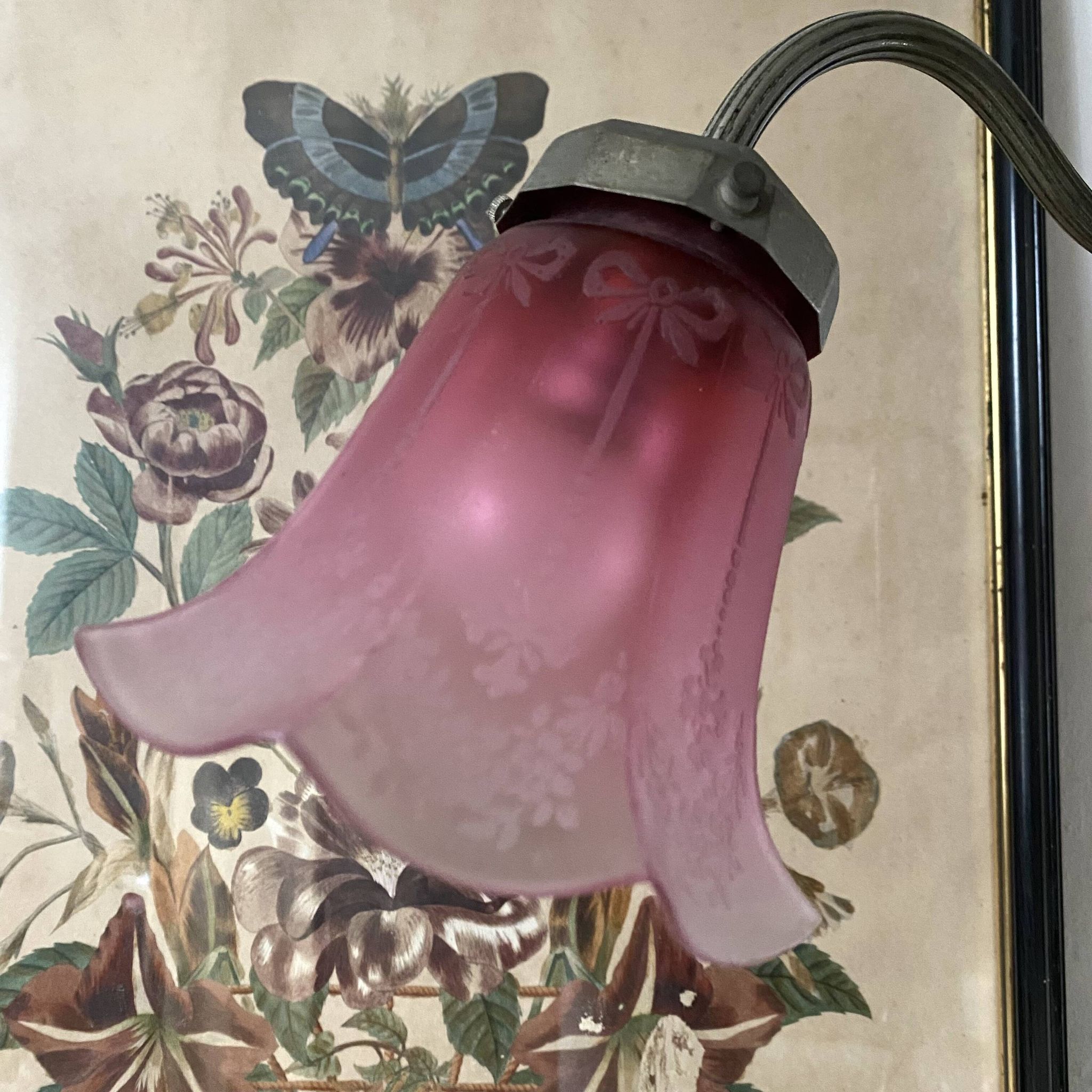 Antique jeweller's lamp, silver-plated base, frosted pink glass shade.