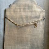 Patinated gilded mirror in wood and plaster