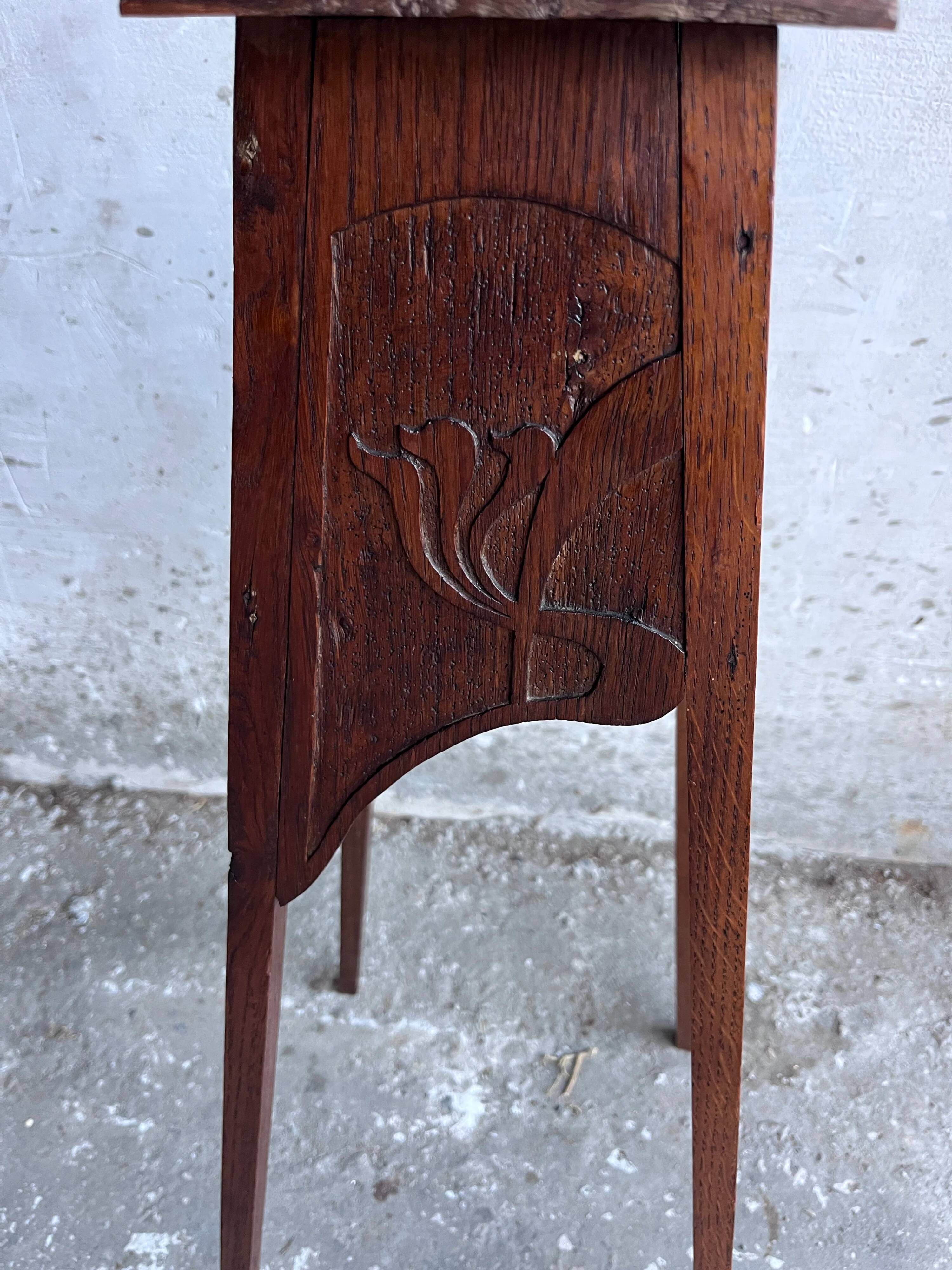 Sculpted wooden plant stand in Art Nouveau style, circa 1910.