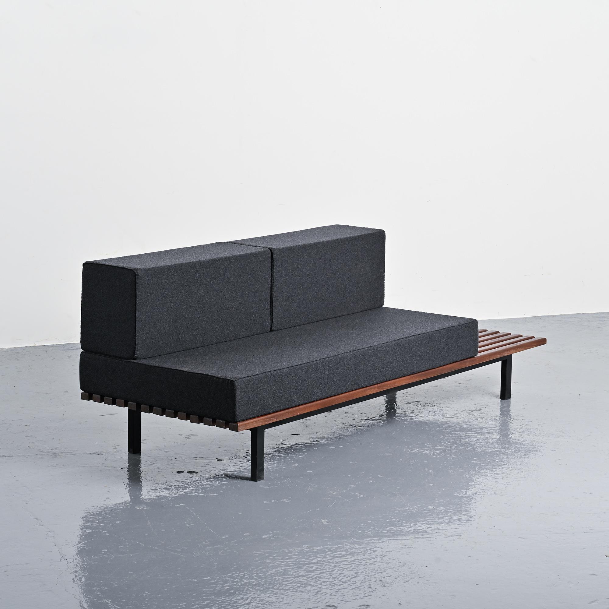 Cansado bench in mahogany by Charlotte Perriand, circa 1962.