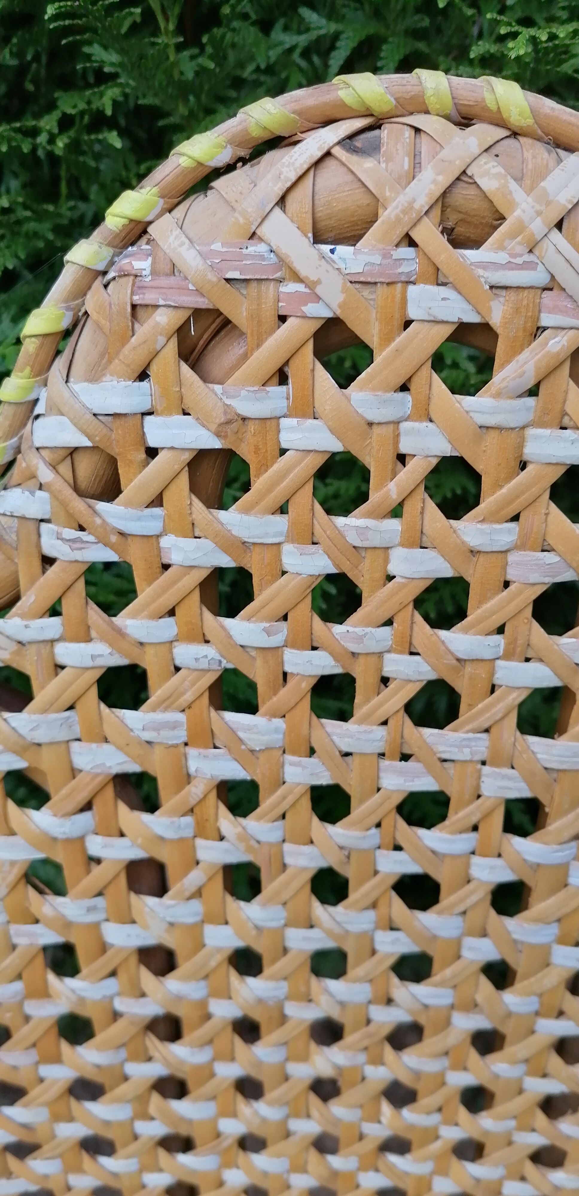 3 woven rattan armchairs