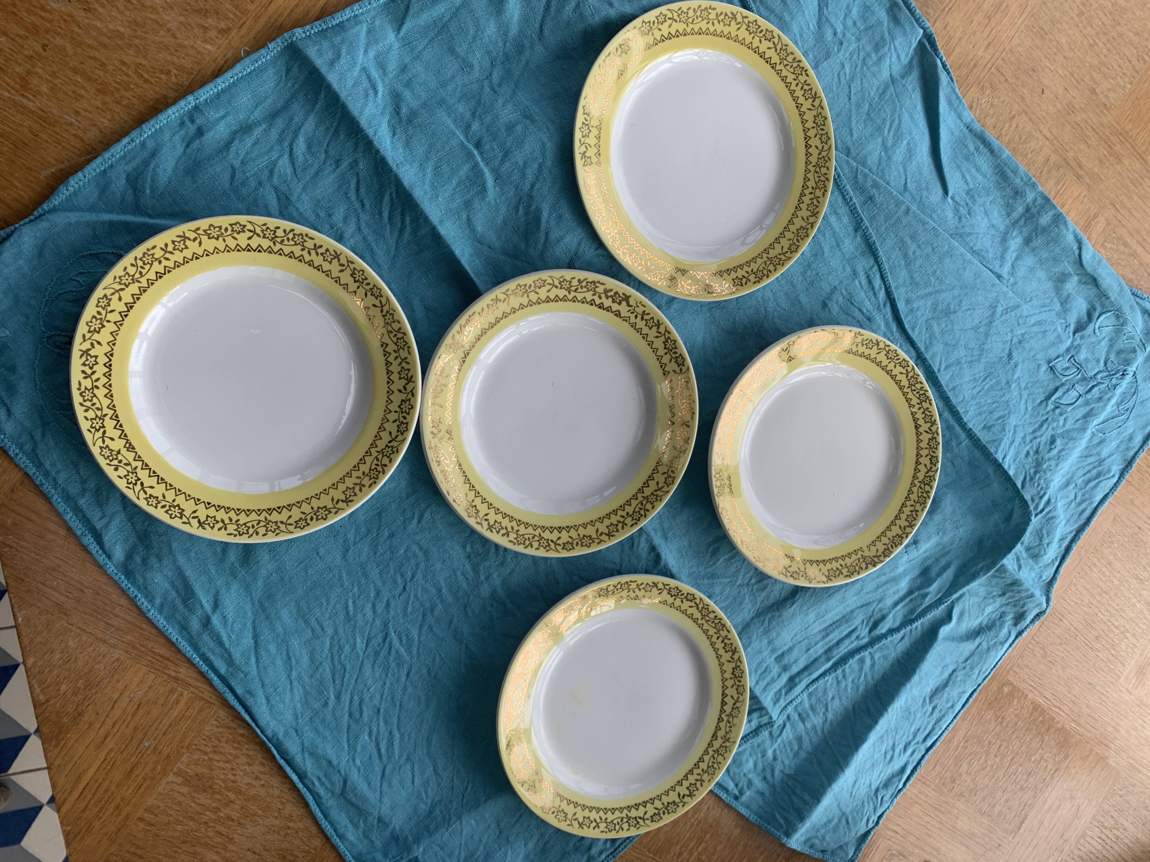 6 small plates with yellow borders and floral pattern gold antiques