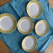 6 small plates with yellow borders and floral pattern gold antiques