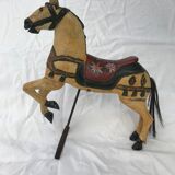 Wooden horse with period ironwork support