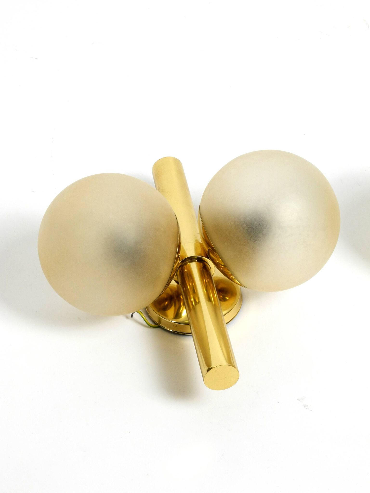 Pair of beautiful 60s Kaiser brass wall lamps with two golden glass spheres