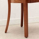 Stoelcker chair in black faux leather and oak