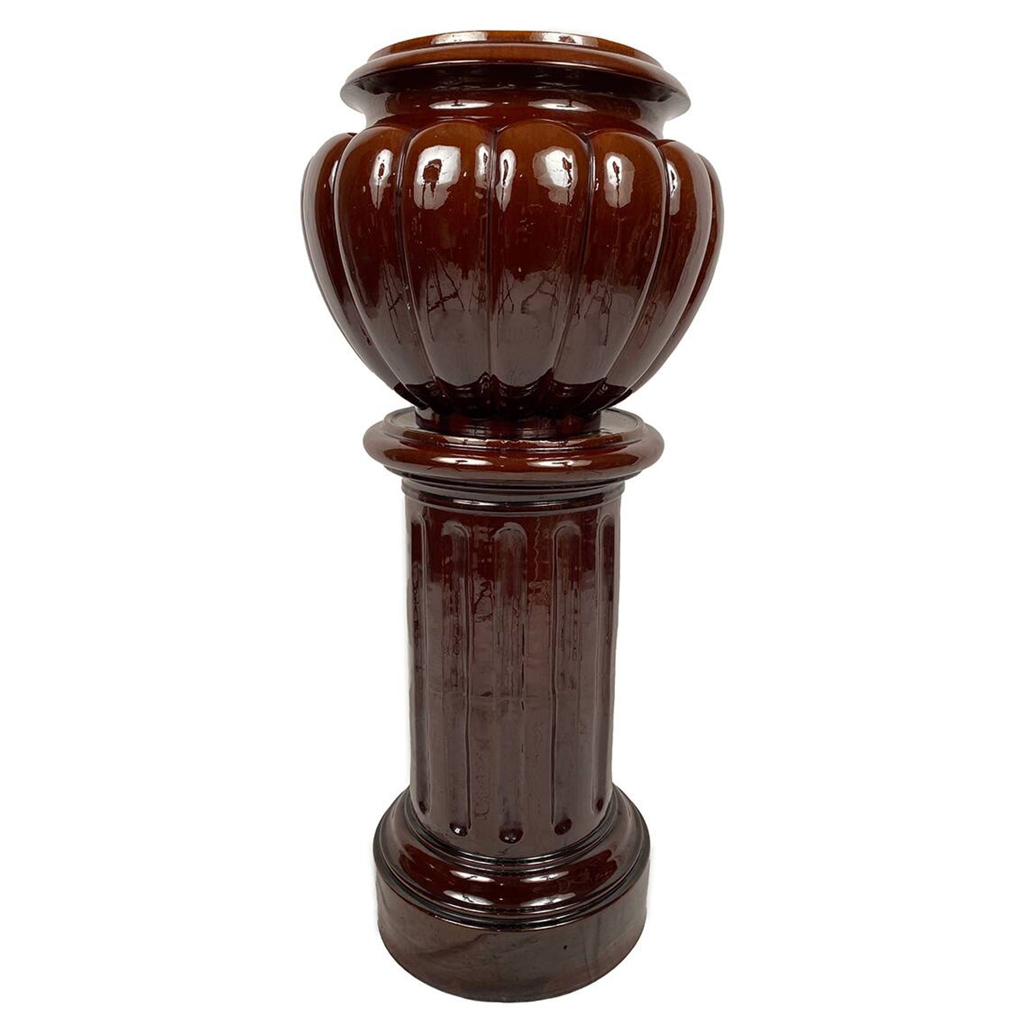Complete in brown-toned enamelled ceramic, planter on its column