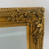 Bevelled mirror, golden empire style 74x64cm