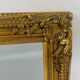 Miroir biseauté style empire doré 74x64cm
