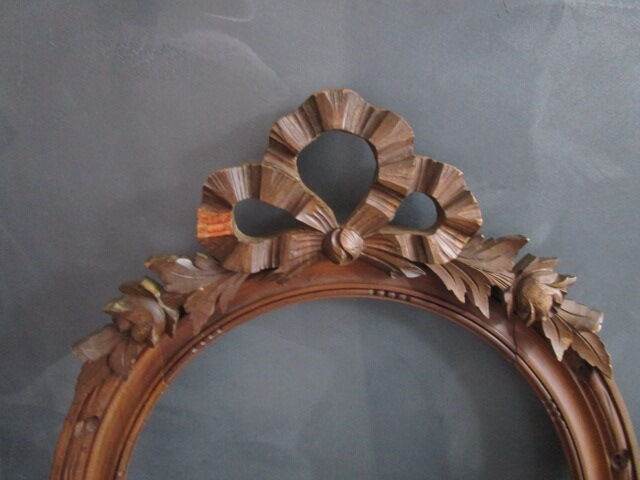 Old oval wooden frame