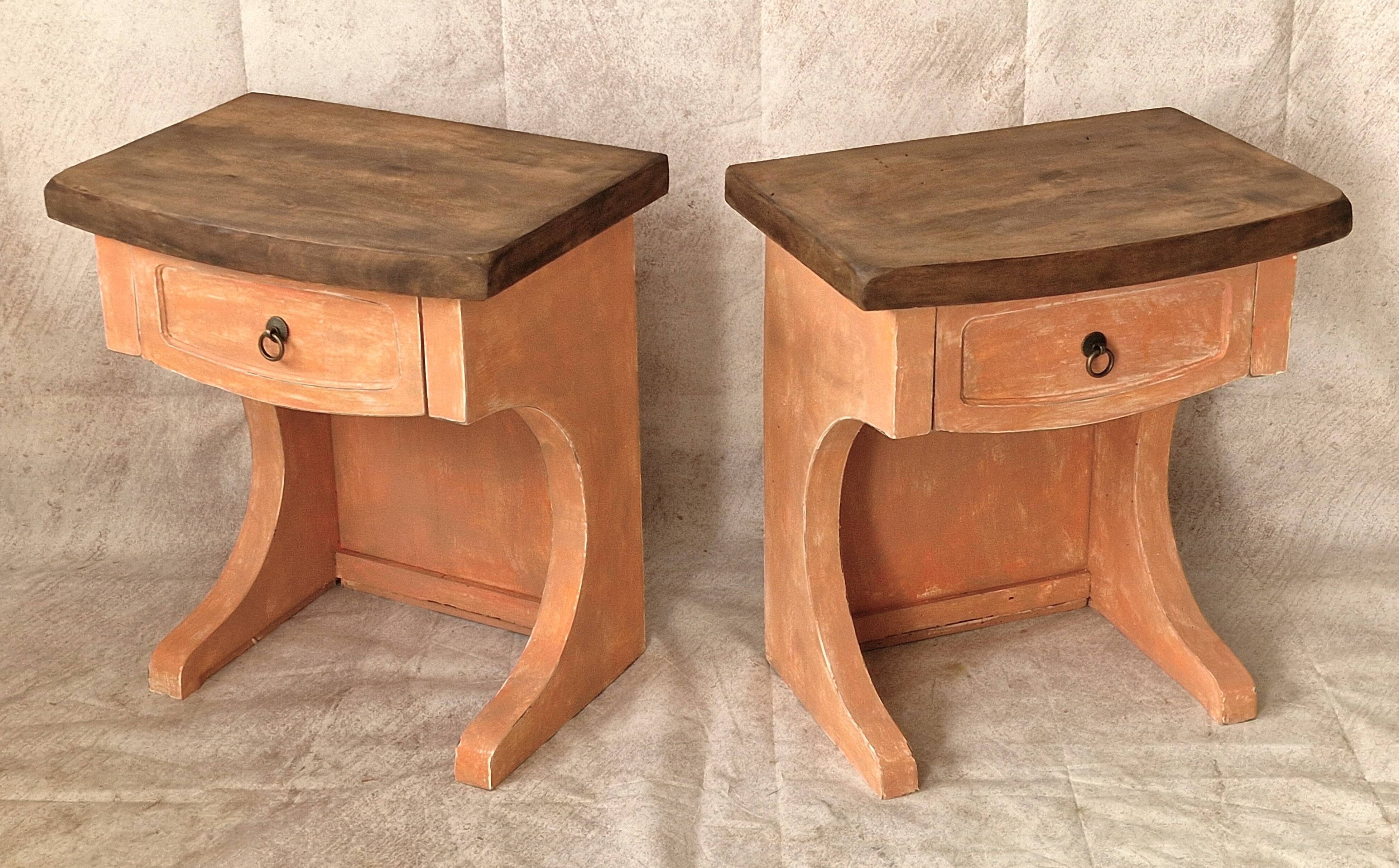Pair of orange-pink patinated bedside tables