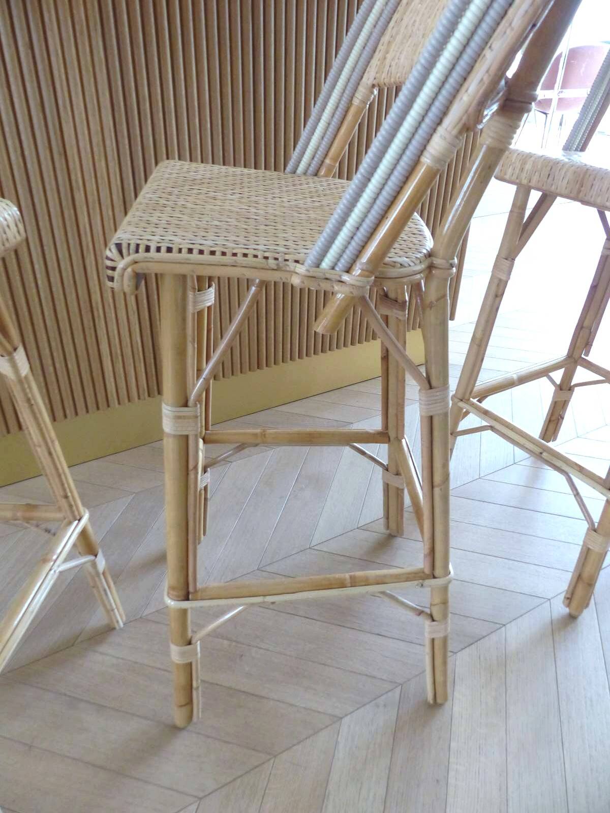 Lot of 3 Maison Louis Drucker light Manila rattan bistro high chairs.