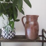 Vintage pitcher in glazed sandstone