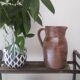Vintage pitcher in glazed sandstone