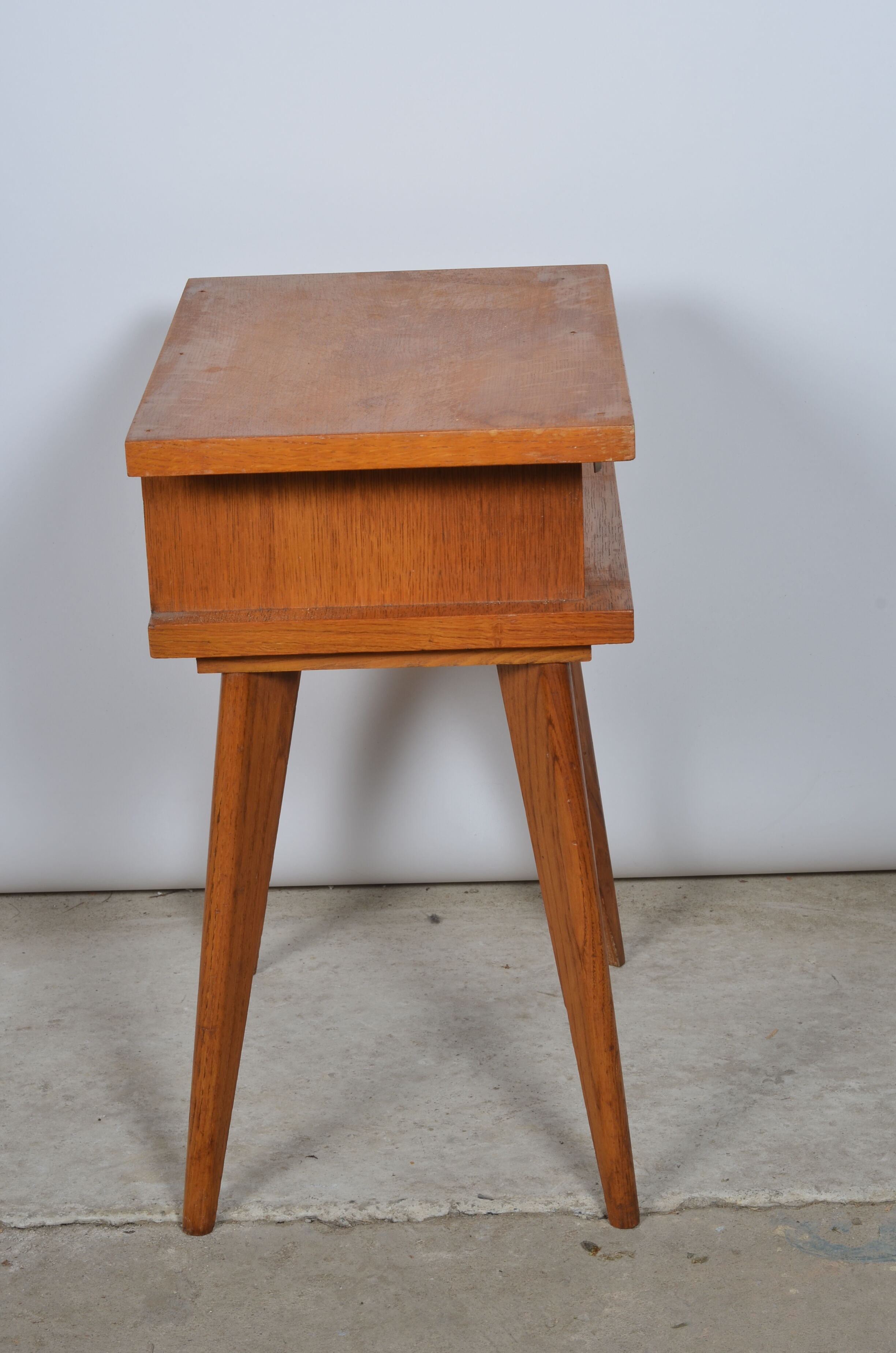 Compass feet bedside table