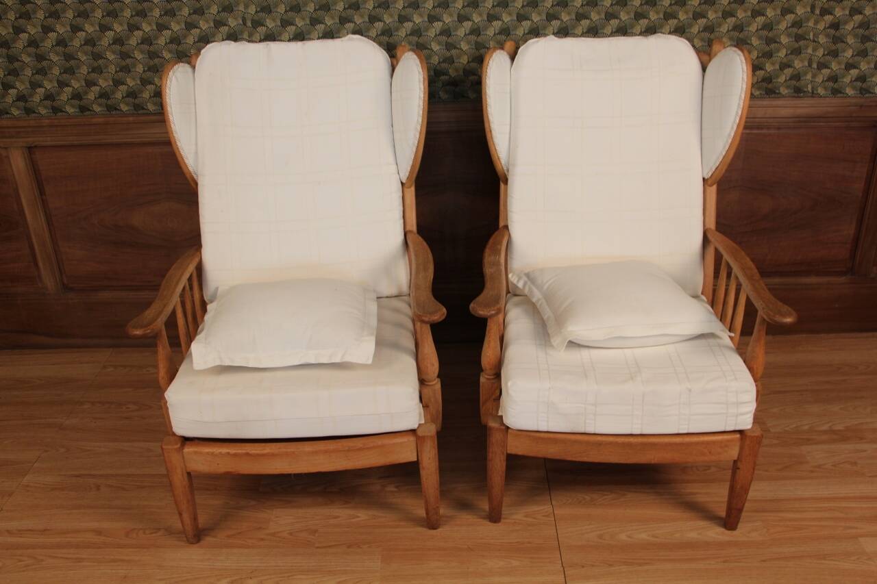 Pair of armchairs with ears of the 50s in oak