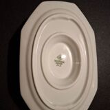 Dishes and porcelain sauceboat