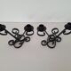 Vintage black wrought iron candlestick