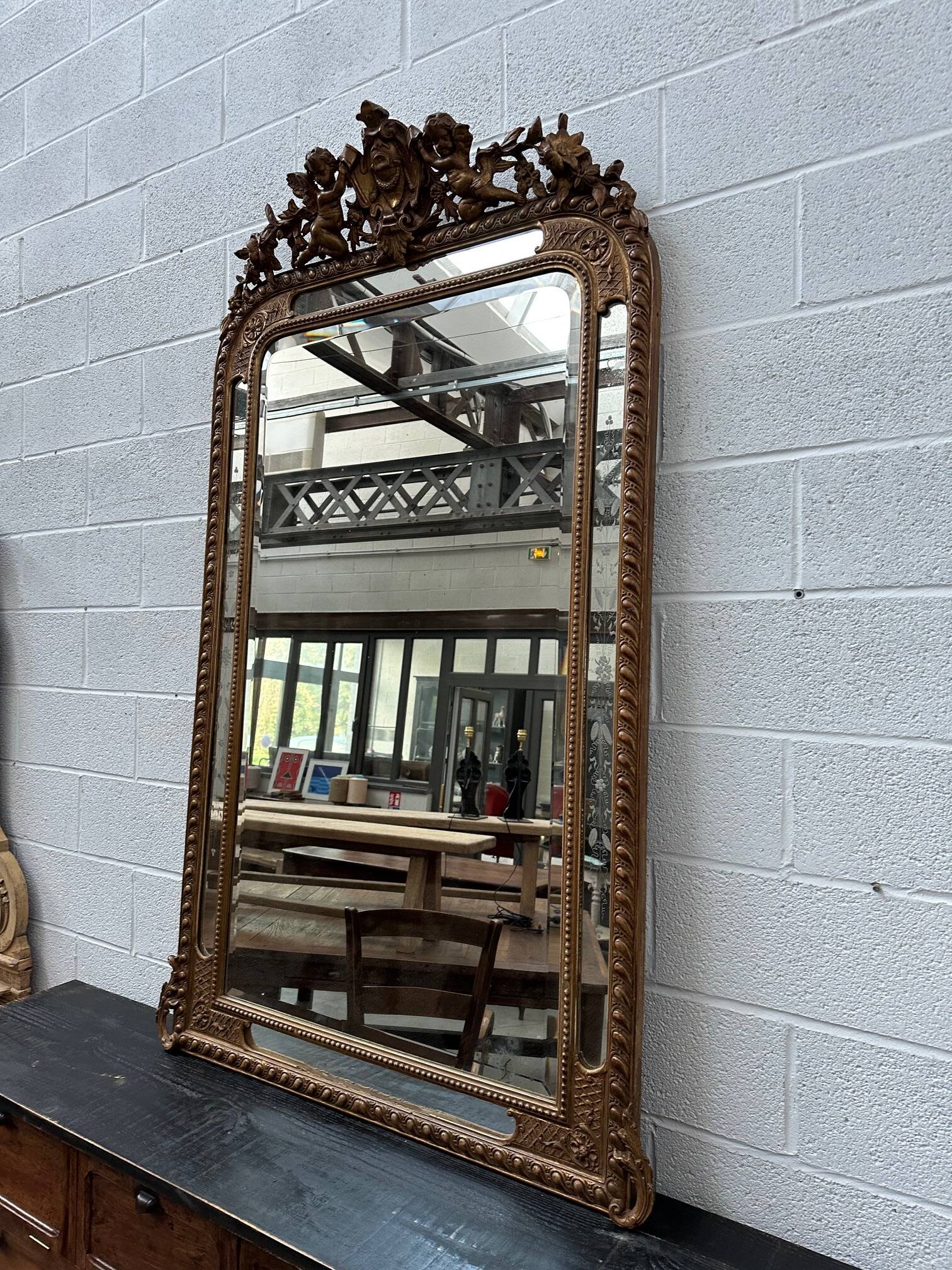 19th century mirror with cherubs