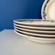 Set of 6 semi-deep plates in ironstone Longchamp model Denise.