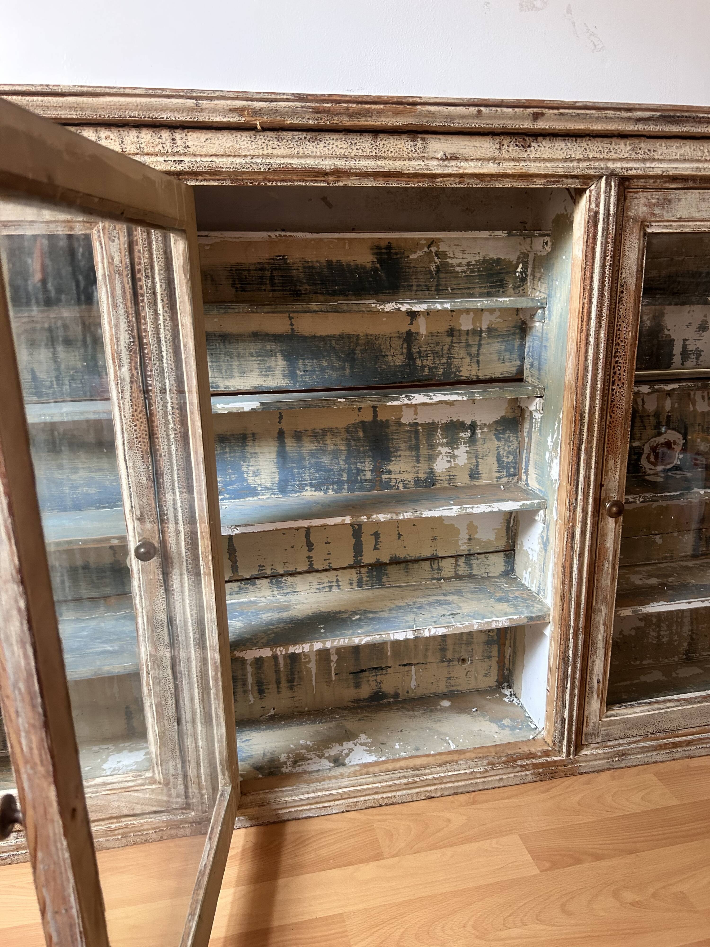 Old wooden shop display case to hang from the early 20th century.