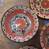 Set of etnic ceramic cups and plates