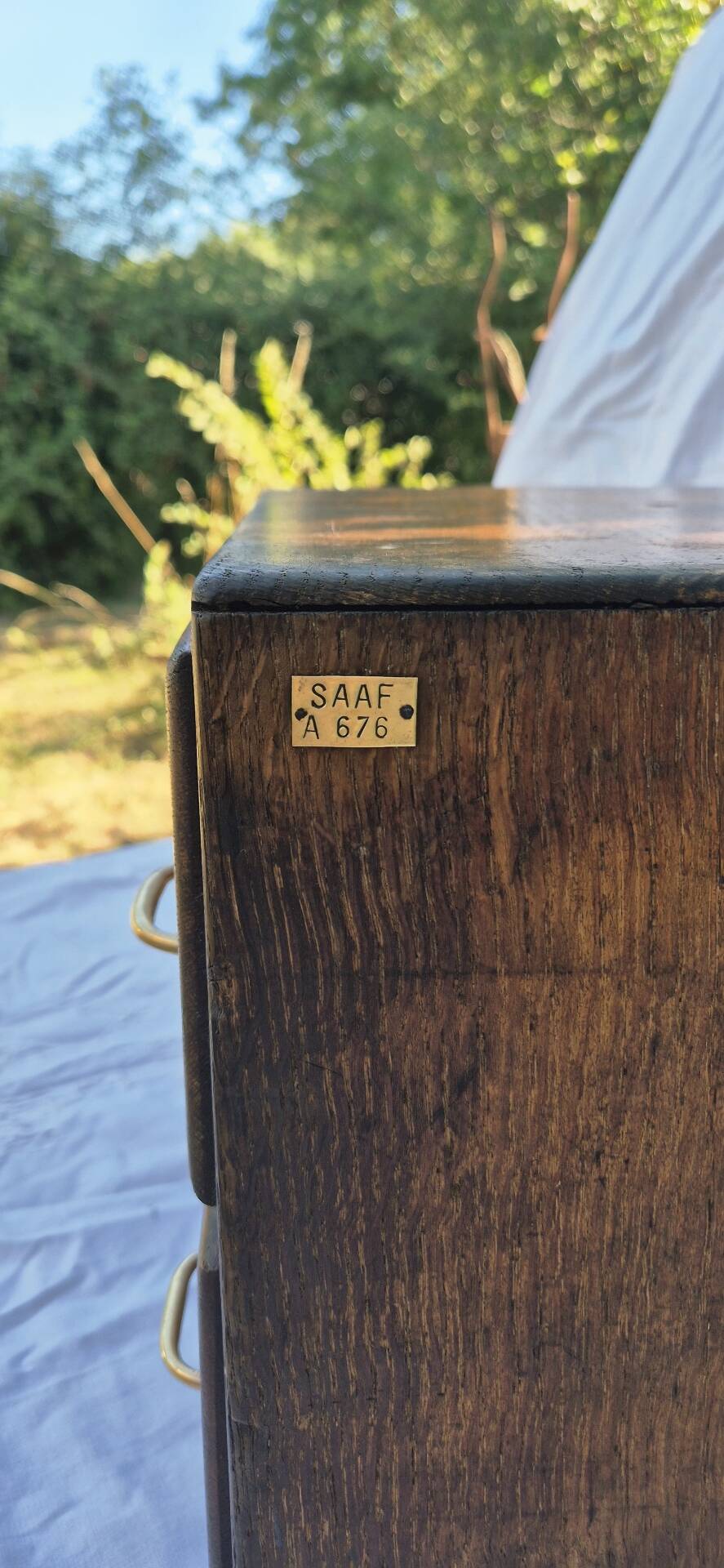 Workshop furniture made of oak and brass.