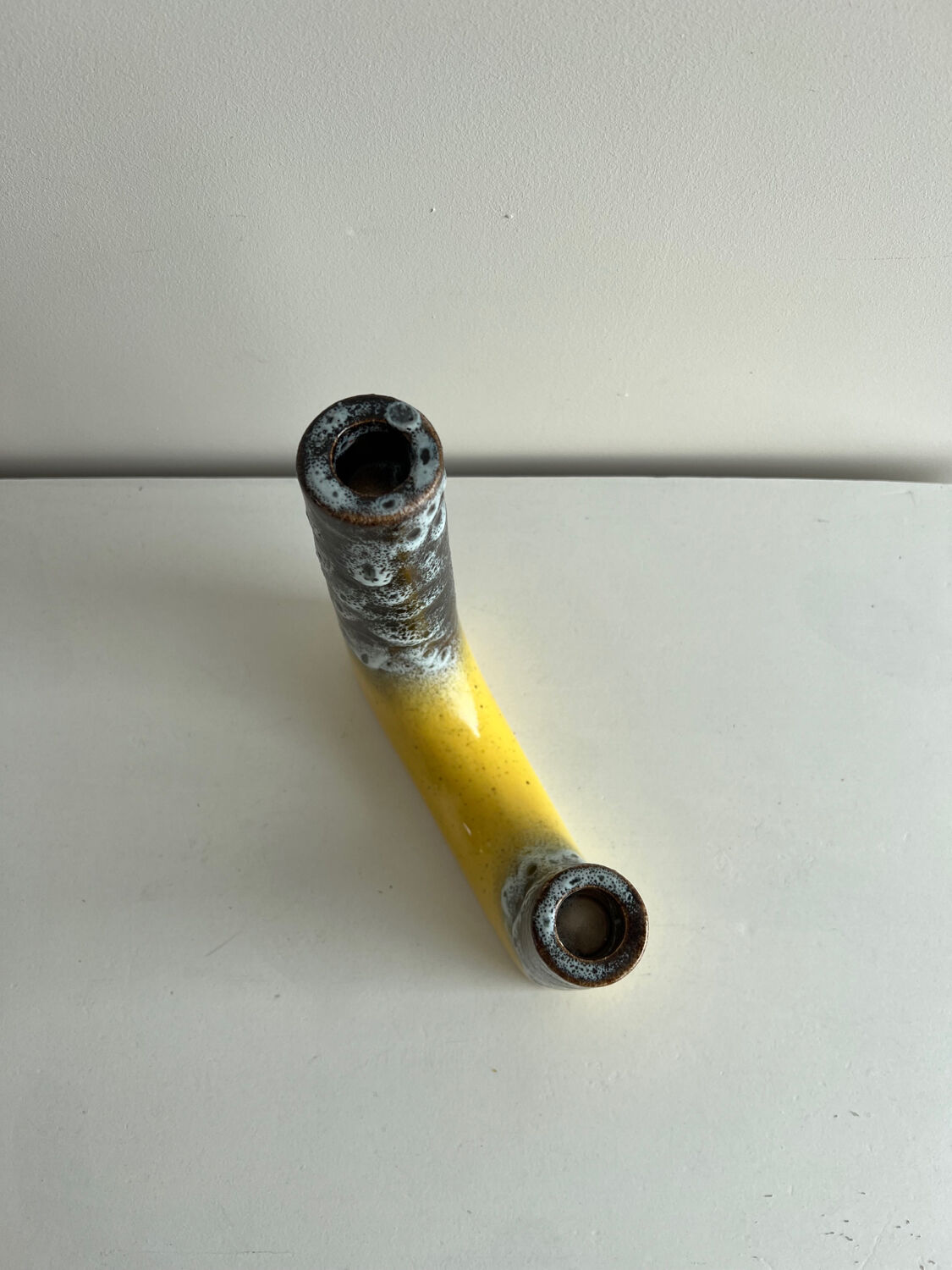 Double asymmetrical candle holder