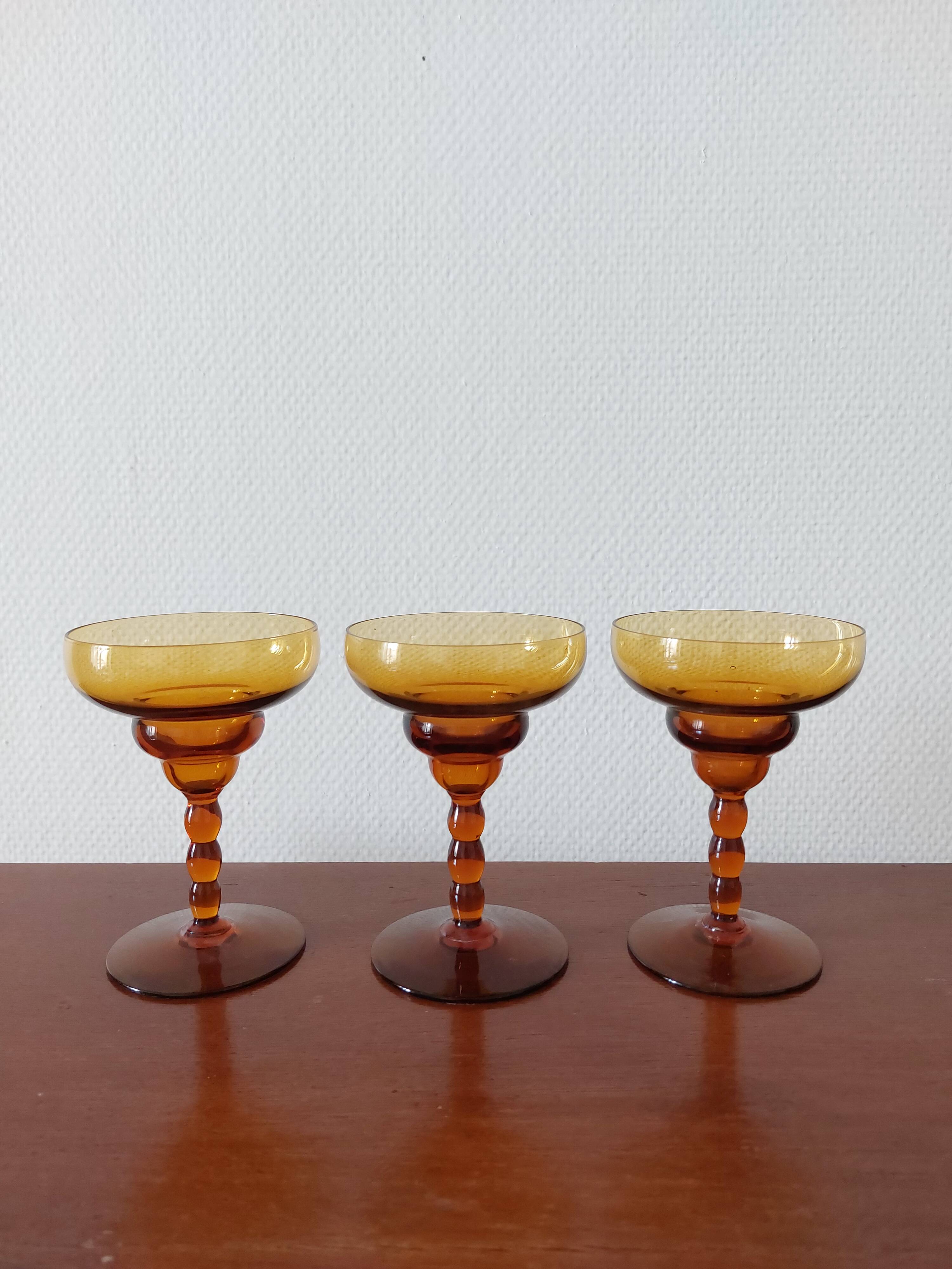 Set of 3 vintage amber foot glasses