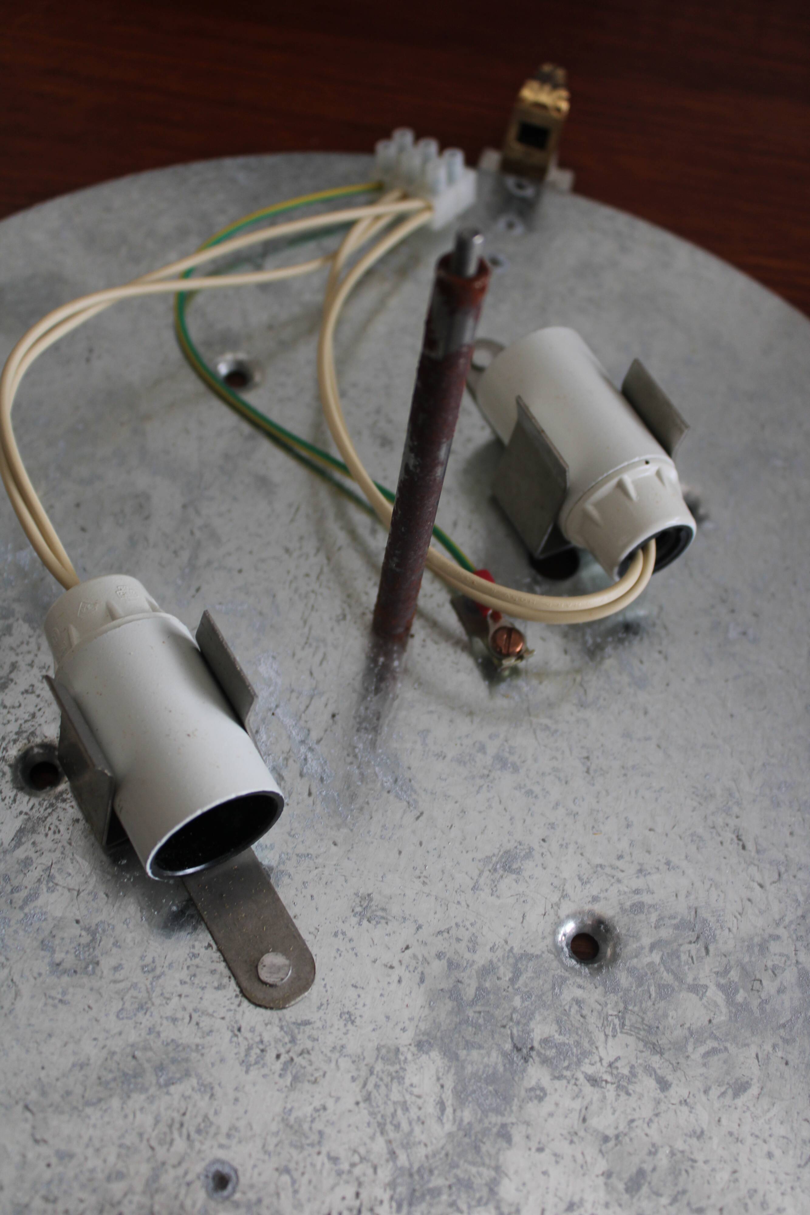Brass ceiling light with moulded glass