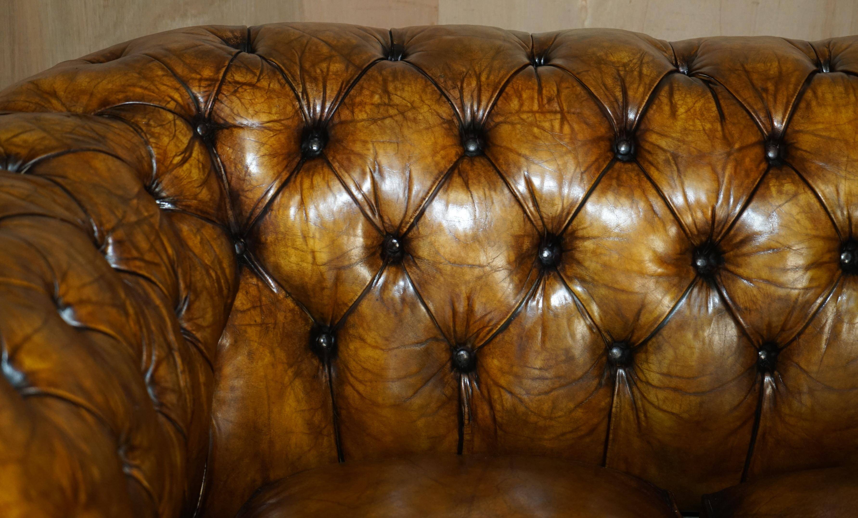 Vintage Chesterfield leather sofa bed, fully restored, circa 1940.