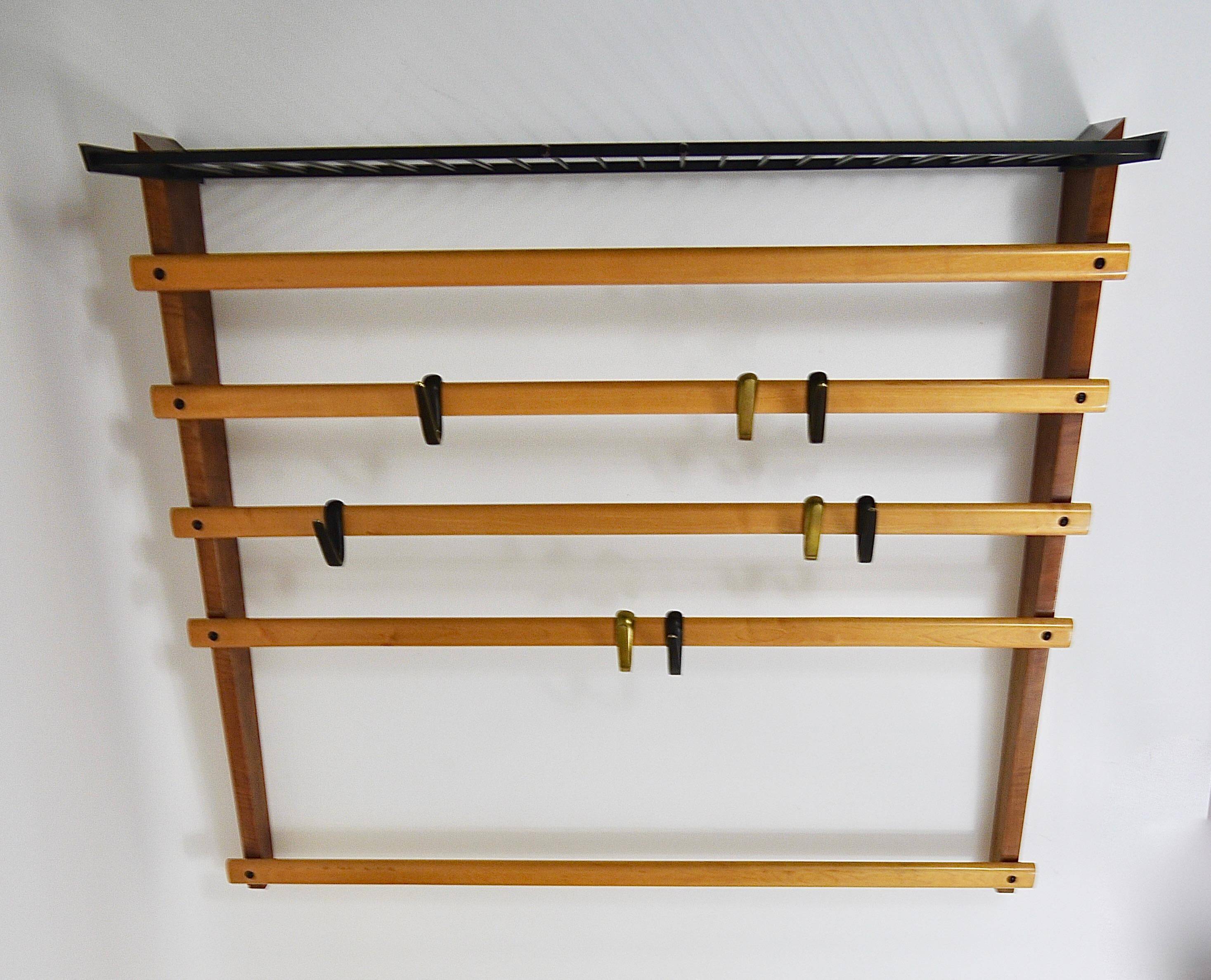 Rare coat rack by Carl Auböck with hat rack, cabinet, brass, walnut and beech, 1950s.