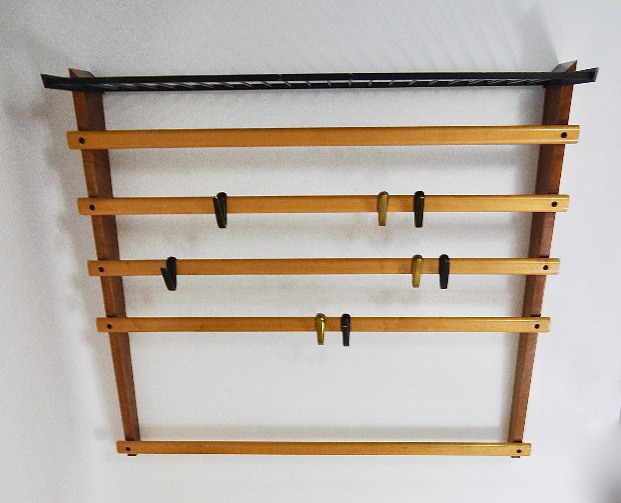 Rare coat rack by Carl Auböck with hat rack, cabinet, brass, walnut and beech, 1950s.