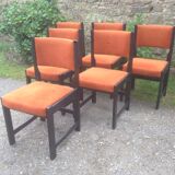 Series of 6 vintage chairs in orange fabric and black lace-up.