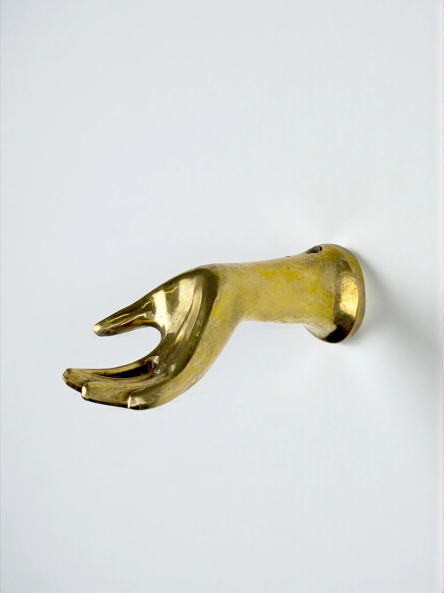 Bronze hand-shaped wall hook, gilded finish, Italy, 1970s